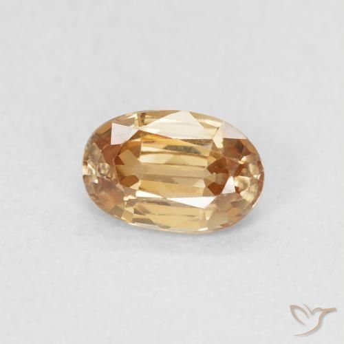 Zircão Dourado Pêssego Claro Natural 0.70ct, oval, VVS-VS