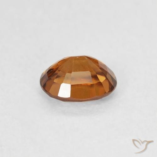 Zircão Laranja Profundo Natural 0.61ct, oval, VS
