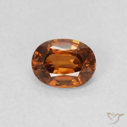 0.60ct Natural Medium Dark-Orange Zircão, oval, VS