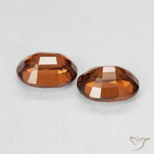Pedras preciosas de Zircão Laranja Profundo natural de 1.27 ct, oval, VVS