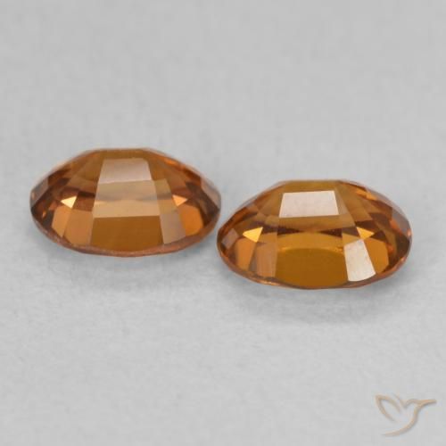 Pedras preciosas de Zircão Medium Dark-Orange natural de 1.27 ct, oval, VVS-VS