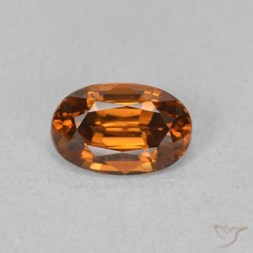 0.78ct Natural Medium Dark-Orange Zircão, oval, VVS, Photo A