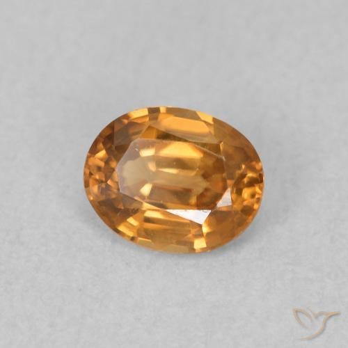 Zircão laranja marrom Natural 0.61ct, oval, VVS