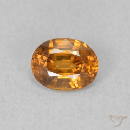 0.60ct Natural ferrugem laranja Zircão, oval, VVS