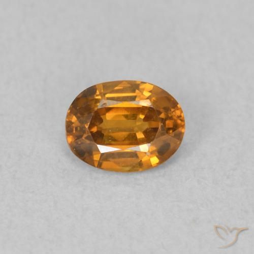 0.58ct Natural Laranja acastanhado Zircão, oval, VVS-VS