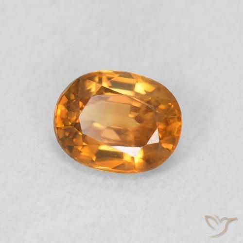 Zircão Laranja Médio Natural 0.61ct, oval, VVS-VS