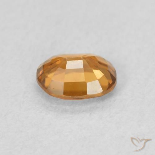 Zircão Laranja Médio Natural 0.61ct, oval, VVS-VS
