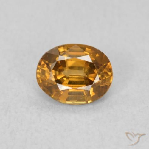 0.60ct Natural laranja marrom Zircão, oval, VVS