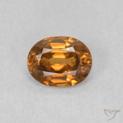 0.59ct Natural laranja marrom Zircão, oval, VVS-VS