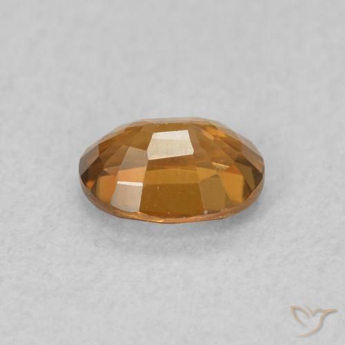 Zircão laranja marrom Natural 0.59ct, oval, VVS-VS