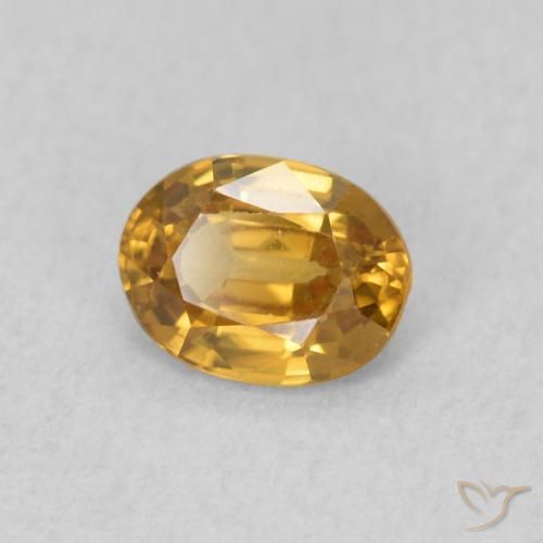Zircão Dourado-Laranja Natural 0.57ct, oval, VVS-VS