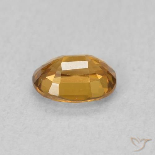 Zircão Dourado-Laranja Natural 0.62ct, oval, VVS