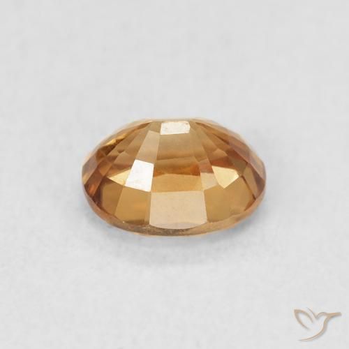 Zircão Pêssego Dourado Natural 1.09ct, oval, VS
