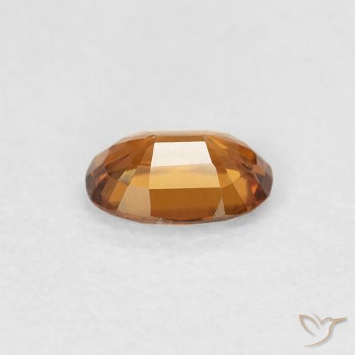 Zircão laranja marrom Natural 0.65ct, oval, VVS-VS