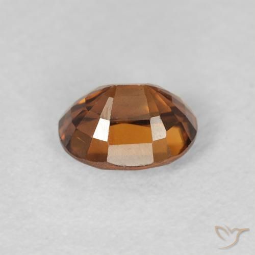 Zircão Laranja Marrom Profundo Natural 1.12ct, oval, VVS-VS