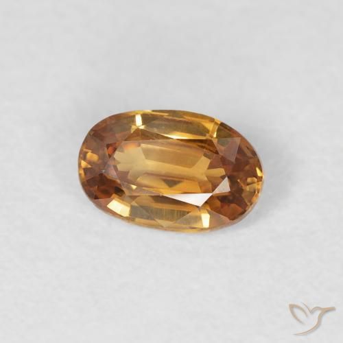 Zircão Laranja Médio Natural 0.70ct, oval, VVS-VS