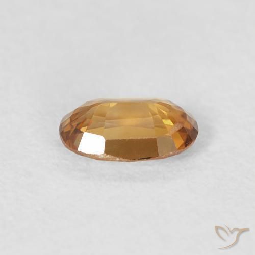 Zircão Laranja Médio Natural 0.70ct, oval, VVS-VS